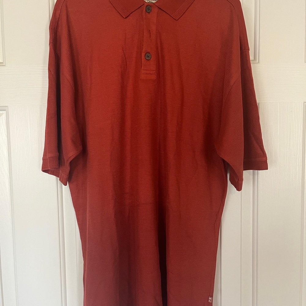Tommy Bahama shirt. Tags say size M but fits like a L or even XL.  70% silk
